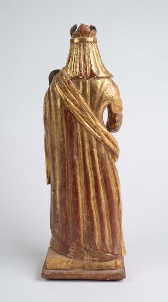 Carved, polychrome, and gilded wooden Virgin...