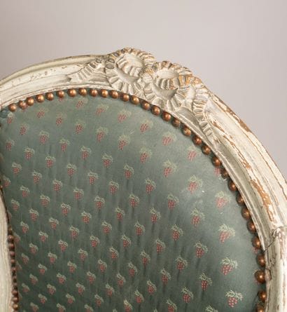 Armchair with a cabriolet back made of molded,...