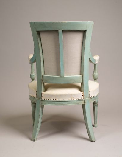 Armchair with a cabriolet back made of molded...