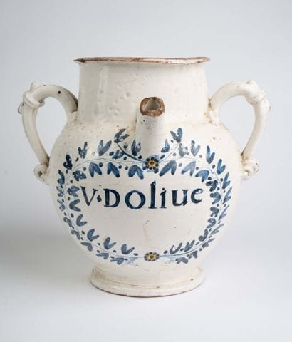 Large cream-colored earthenware goat with...