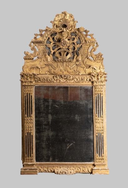Mirror with glazing beads and a molded, carved,...