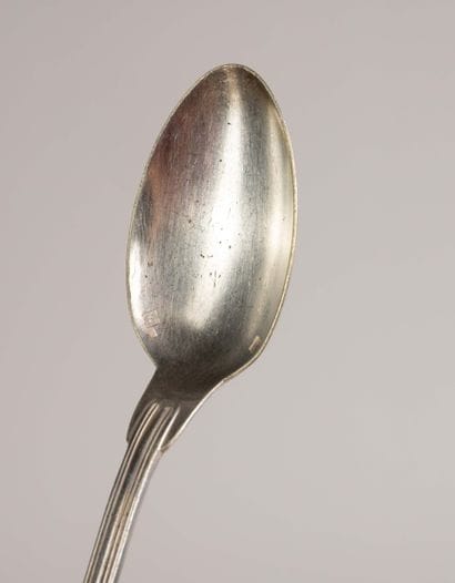 Set of 17 small silver spoons, marked with...
