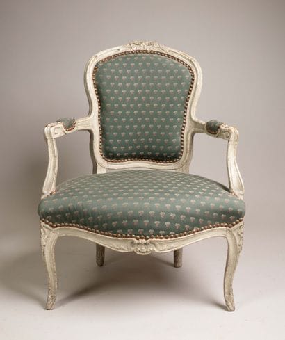 Armchair with a cabriolet back made of molded,...