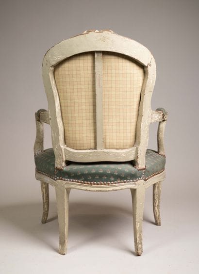 Armchair with a cabriolet back made of molded,...