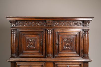 Molded and carved walnut sideboard, decorated...