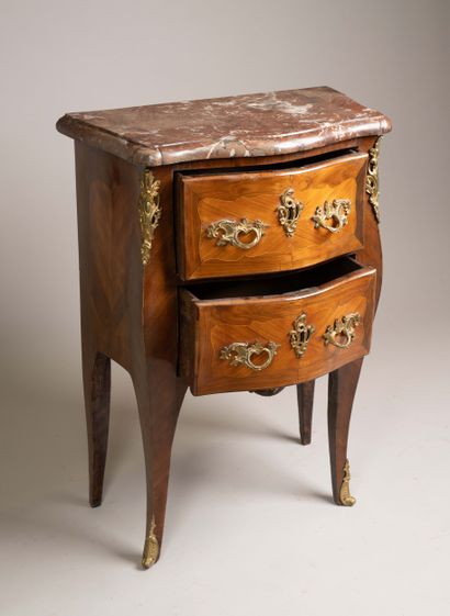 Curved “entre-deux” chest of drawers made...