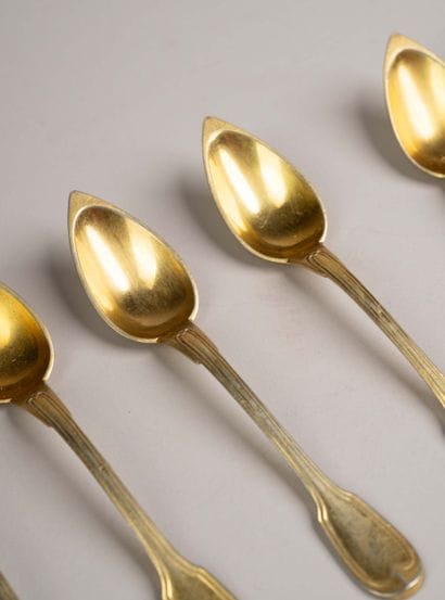 Set of 10 small gold-plated metal spoons...