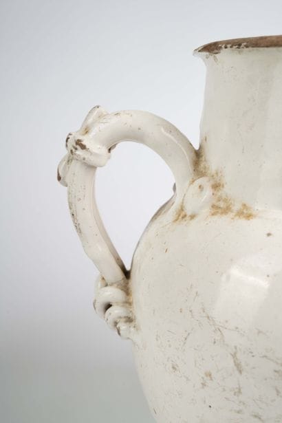Large cream-colored earthenware goat with...