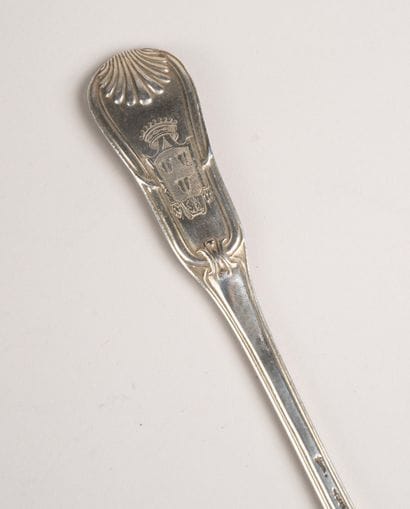Silver stew spoon, with decorative ridges....