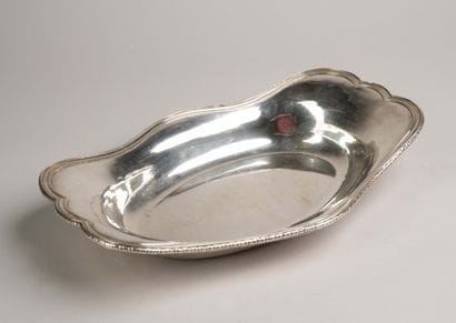Plain silver basket with a net-like border,...