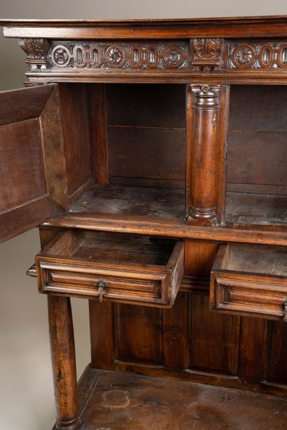 Molded and carved walnut sideboard, decorated...