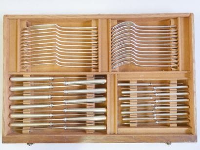A large white metal dinner set, a 1950s model...