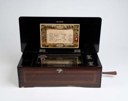 Rectangular wooden music box decorated with...