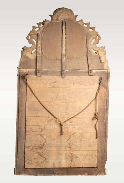 Mirror with glazing beads and a molded, carved,...