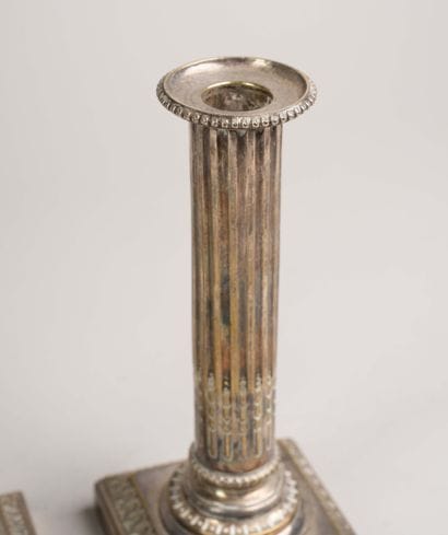 Pair of silver plated “à la financière” candlesticks,...