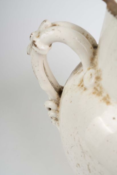 Large cream-colored earthenware goat with...