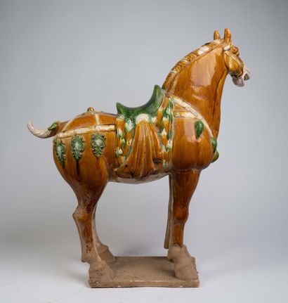 Pair of polychrome ceramic horse statues...