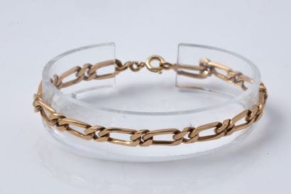 Yellow gold (750) Figaro-link bracelet. 
Width:...