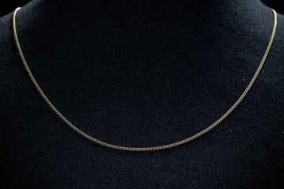 Small, worn yellow gold chain (750 parts...