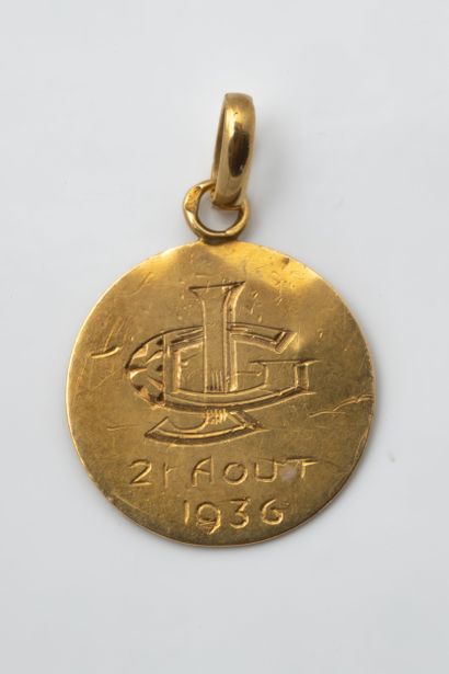 Small yellow gold (750) St. John medal. Engraver:...