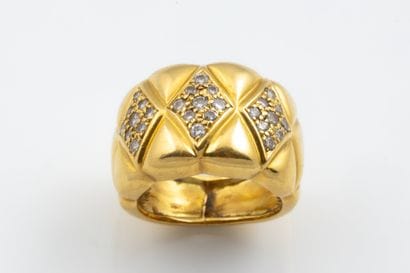 Wide embossed ring set with three diamond...