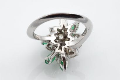 Elongated bouquet-style ring in platinum...