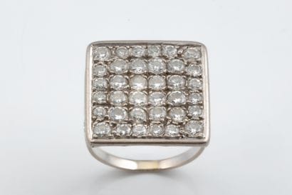 A large square ring set with 36 brilliant-cut...