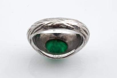 Platinum (850) dome ring set with a tinted...