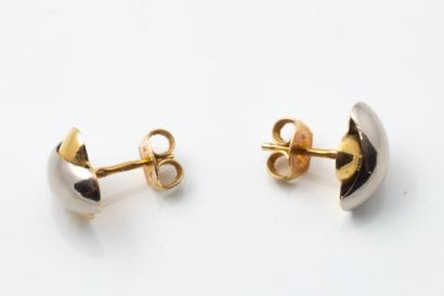 Pair of half-godron crossed earrings in yellow...