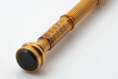 Stylo or jaune (750 millièmes) avec un calendrier...