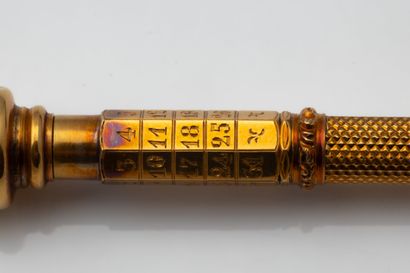 Stylo or jaune (750 millièmes) avec un calendrier...