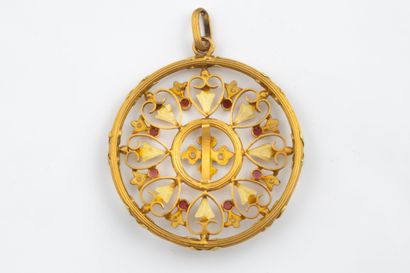 Large, intricately crafted pendant in the...