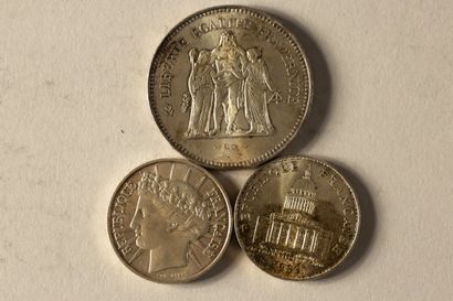 3 silver coins. Oxidized 
- Two 100-franc...