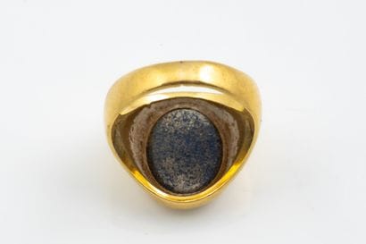 Oval signet ring featuring a lapis-effect...