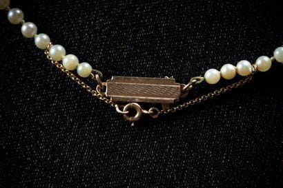 Necklace featuring a cascade of 105 white...