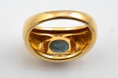 Half-moon-shaped band set with a faceted...