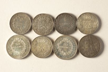 - 2 silver 50-franc Hercules coins
- 3 5-franc...