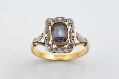 Rectangular ring set with a purplish imitation...