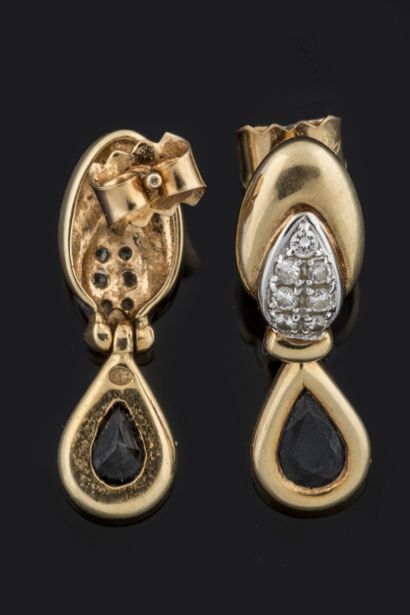 Pair of sapphire and diamond-paved earrings...