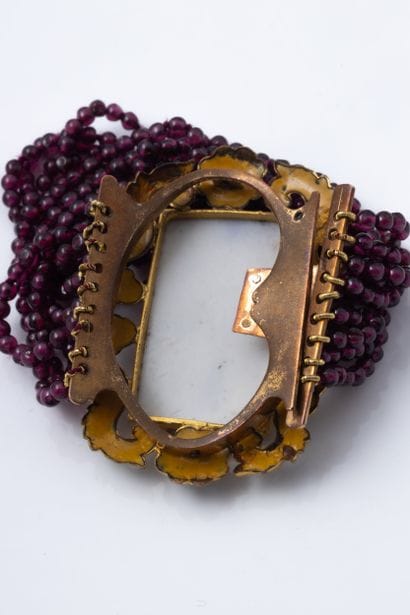 A bracelet with nine rows of garnet beads...
