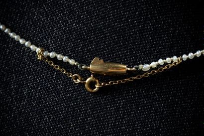 A small necklace made of cultured pearls...