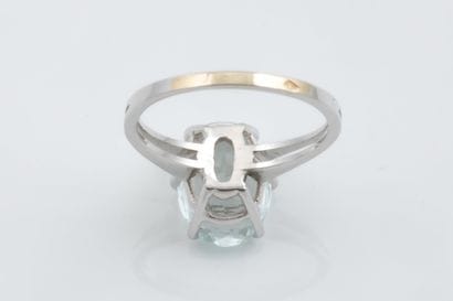 Ring set with a light aquamarine or white/blue...