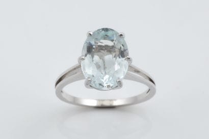 Ring set with a light aquamarine or white/blue...