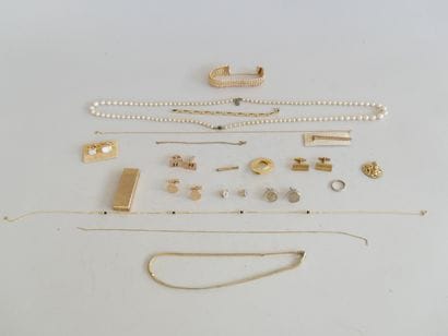 A set of costume jewelry and a lighter
