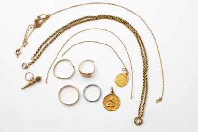 Assortment of used jewelry in yellow and...