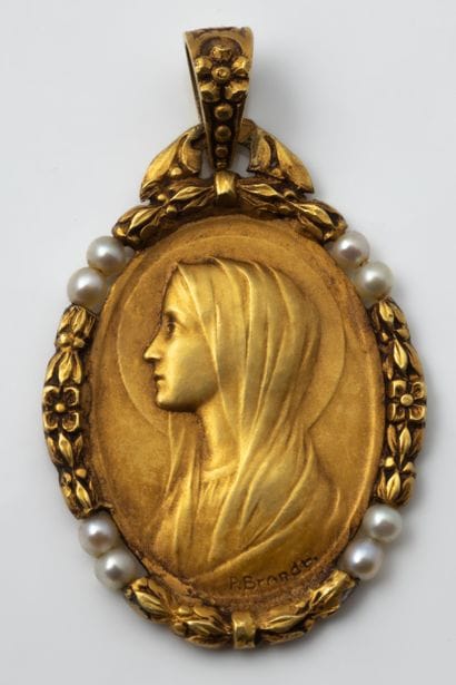 Oval medal depicting a profile of the Virgin...