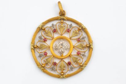 Large, intricately crafted pendant in the...