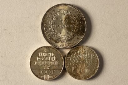3 silver coins. Oxidized 
- Two 100-franc...