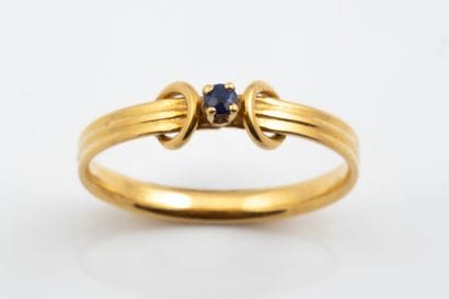 Small ring set with a sapphire in the center,...