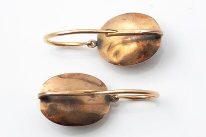 A large pair of antique earrings known as...